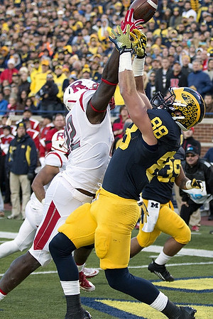 Jake Butt (88) and Sione Houma (39)