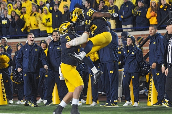 Desmond Morgan (3) and Jourdan Lewis (26)
