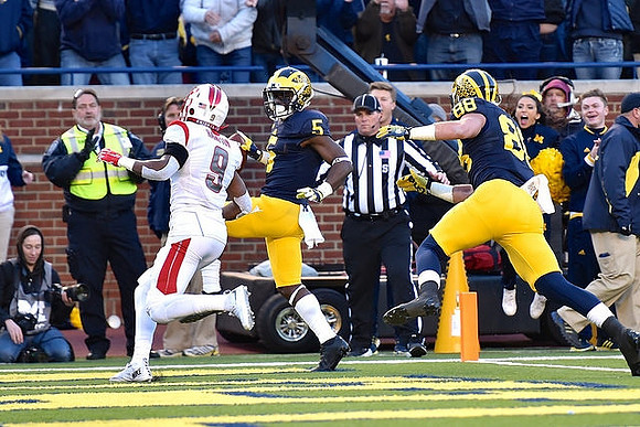 Jabrill Peppers (5) and Jake Butt (88)