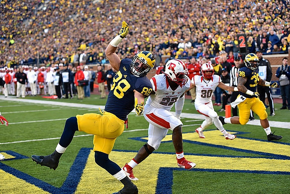 Jake Butt (88) and Sione Houma (39)