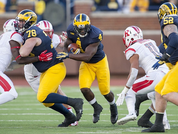 Erik Magnuson (78), De'Veon Smith (4), and Mason Cole (52)