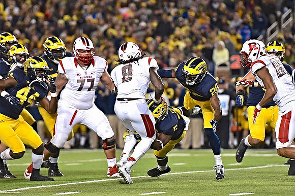 Delano Hill (44), Jabrill Peppers (5), and Jourdan Lewis (26)