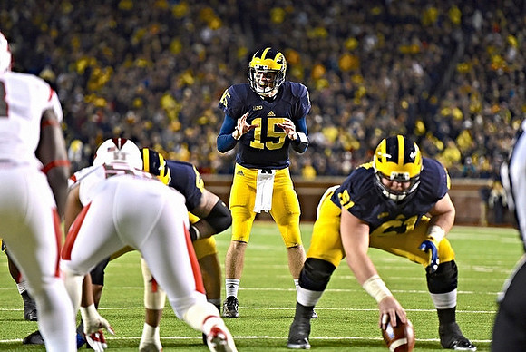 Jake Rudock (15) and Graham Glasgow (61)