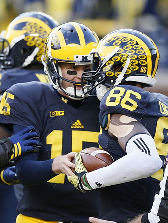 Jake Rudock (15) and Jehu Chesson (86)