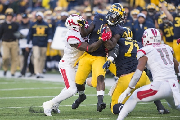 Ben Braden (71) and De'Veon Smith (4)