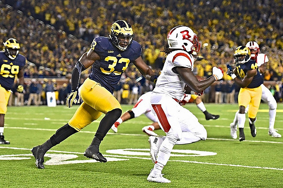 Willie Henry (69), Taco Charlton (33), and Delano Hill (44)