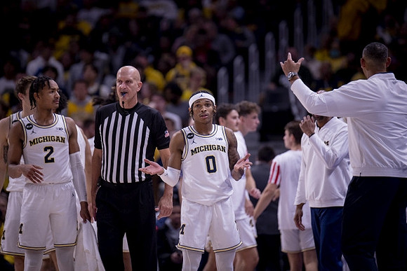 Kobe Bufkin (2) and Dug McDaniel (0)