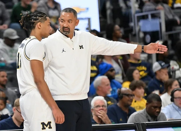 Jett Howard (13) and Juwan Howard