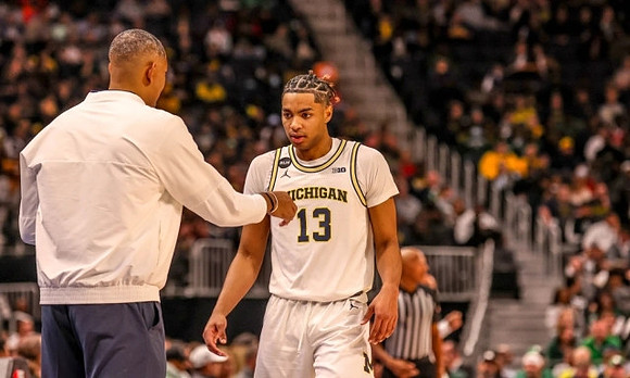 Juwan Howard and Jett Howard (13)