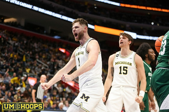 Hunter Dickinson (1) and Joey Baker (15)
