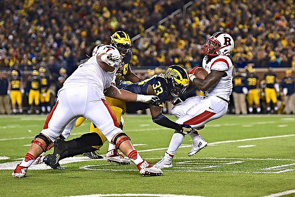 Taco Charlton (33) and Willie Henry (69)