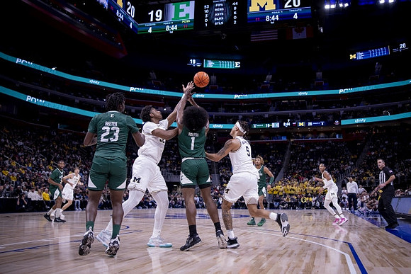 Tarris Reed Jr. (32) and Terrance Williams II (5)