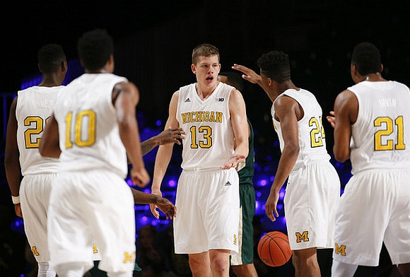 Caris LeVert (23), Derrick Walton Jr. (10), Moritz Wagner (13), Aubrey Dawkins (24), and Zak Irvin (21)