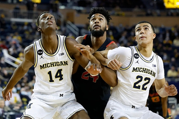 Moussa Diabate (14) and Caleb Houstan (22)