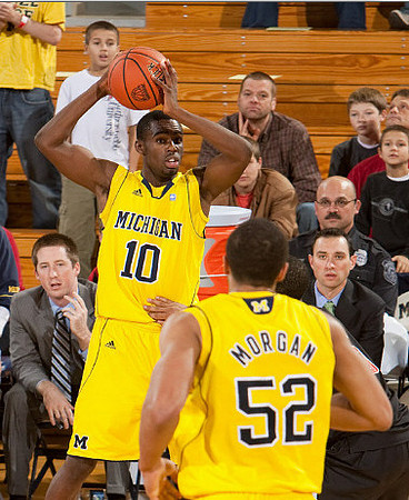 Tim Hardaway Jr. (10) and Jordan Morgan (52)