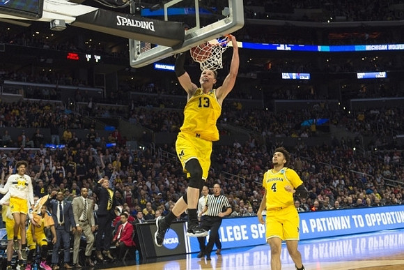 Moritz Wagner (13) and Isaiah Livers (4)