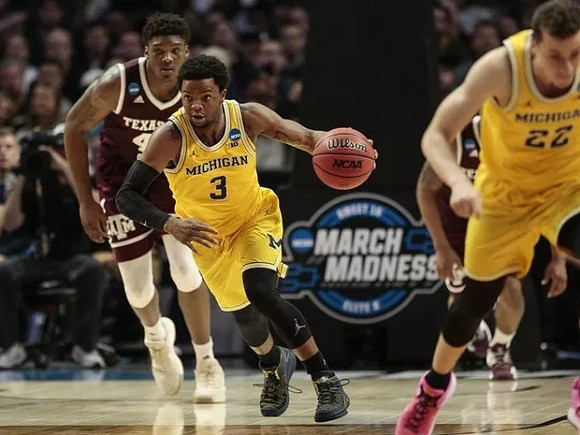 Zavier Simpson (3) and Duncan Robinson (22)