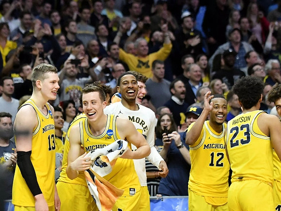 Moritz Wagner (13), Duncan Robinson (22), Charles Matthews (1), Muhammad-Ali Abdur-Rahkman (12), and Ibi Watson (23)