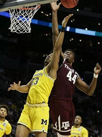 Isaiah Livers (4), Ibi Watson (23), and Muhammad-Ali Abdur-Rahkman (12)
