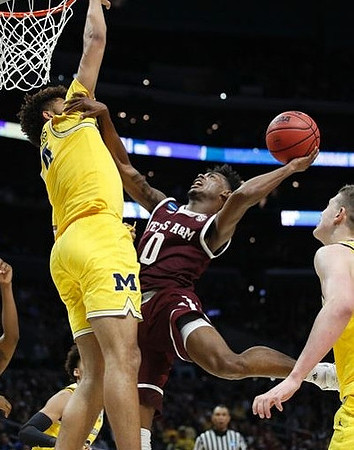 Isaiah Livers (4) and Moritz Wagner (13)