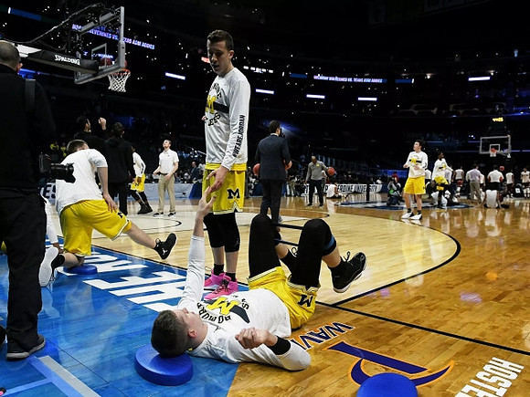 Duncan Robinson (22) and Moritz Wagner (13)