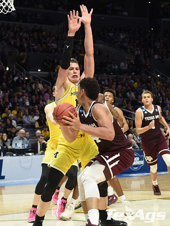 Duncan Robinson (22) and Moritz Wagner (13)