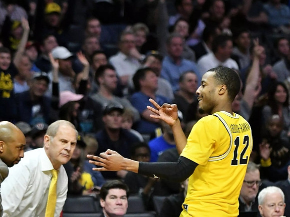 Saddi Washington, John Beilein, and Muhammad-Ali Abdur-Rahkman (12)