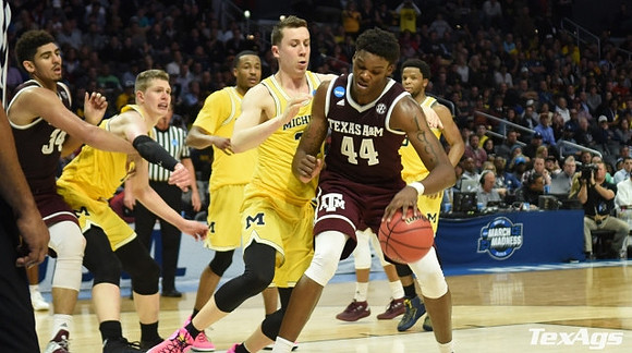 Moritz Wagner (13), Muhammad-Ali Abdur-Rahkman (12), Duncan Robinson (22), and Zavier Simpson (3)