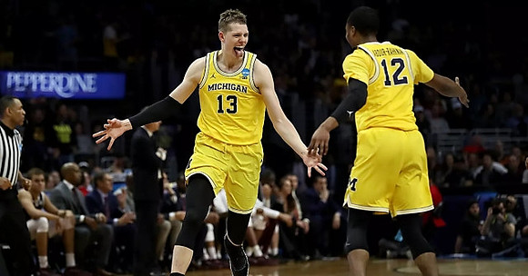 Moritz Wagner (13) and Muhammad-Ali Abdur-Rahkman (12)