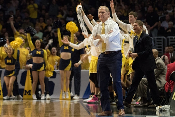 John Beilein, Jon Teske (15), and Luke Yaklich