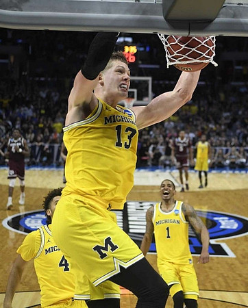 Moritz Wagner (13), Isaiah Livers (4), and Charles Matthews (1)
