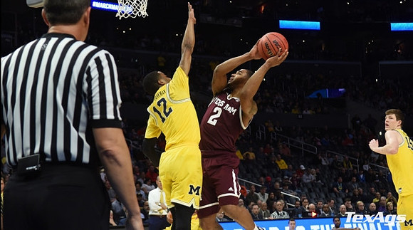 Muhammad-Ali Abdur-Rahkman (12) and Jon Teske (15)