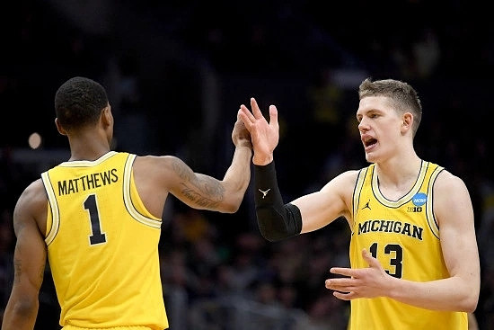 Charles Matthews (1) and Moritz Wagner (13)