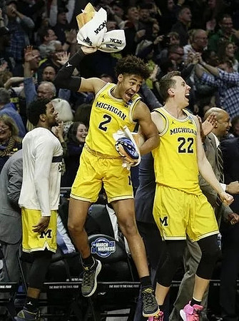 Zavier Simpson (3), Jordan Poole (2), and Duncan Robinson (22)