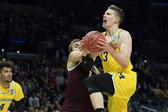 Isaiah Livers (4) and Moritz Wagner (13)