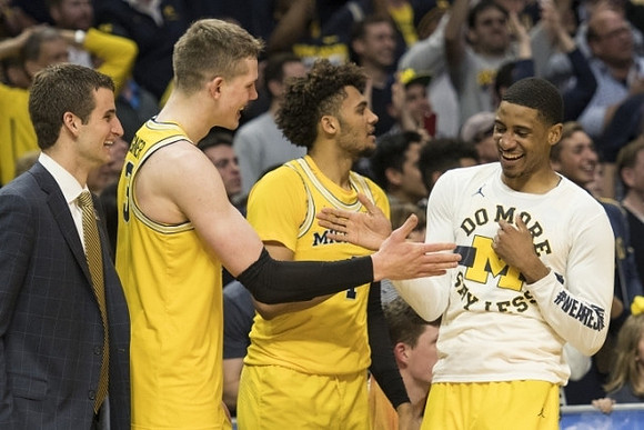 Austin Hatch (30), Moritz Wagner (13), Isaiah Livers (4), and Charles Matthews (1)