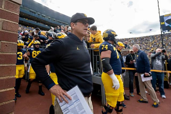 Jim Harbaugh and Ben Bredeson (74)