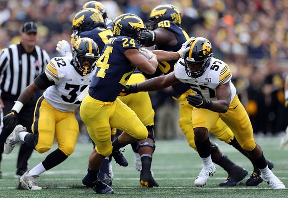 Lavert Hill (24) and Michael Dwumfour (50)