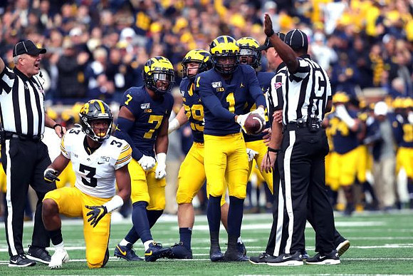 Khaleke Hudson (7), Jordan Glasgow (29), and Ambry Thomas (1)