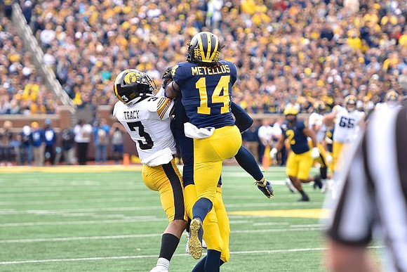 Josh Metellus (14) and Ambry Thomas (1)