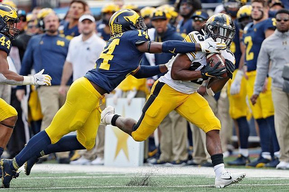 Cameron McGrone (44) and Josh Metellus (14)