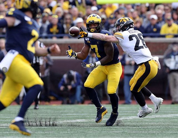 Shea Patterson (2) and Tarik Black (7)