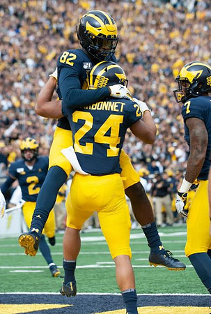Shea Patterson (2), Nick Eubanks (82), Zach Charbonnet (24), and Tarik Black (7)