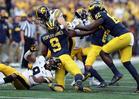Donovan Peoples-Jones (9), Ronnie Bell (8), and Nick Eubanks (82)
