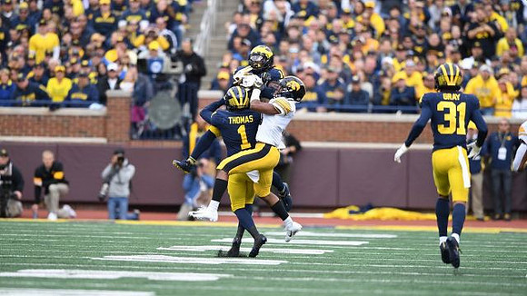 Josh Metellus (14), Ambry Thomas (1), and Vincent Gray (31)