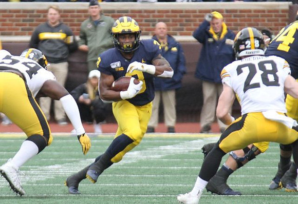 Shea Patterson (2) and Ben Bredeson (74)
