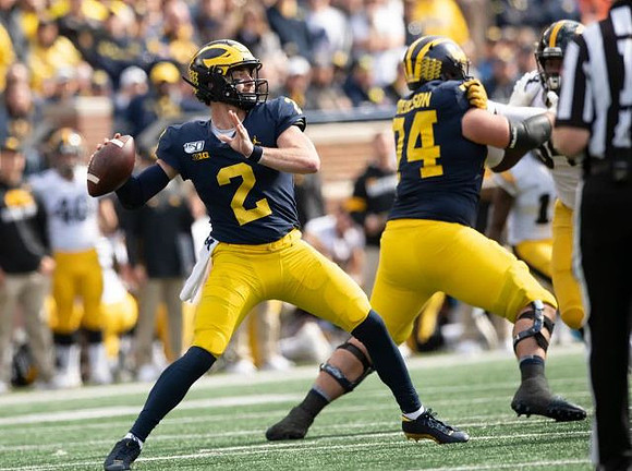 Shea Patterson (2) and Ben Bredeson (74)