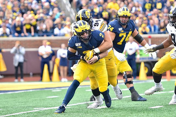 Shea Patterson (2) and Ben Bredeson (74)