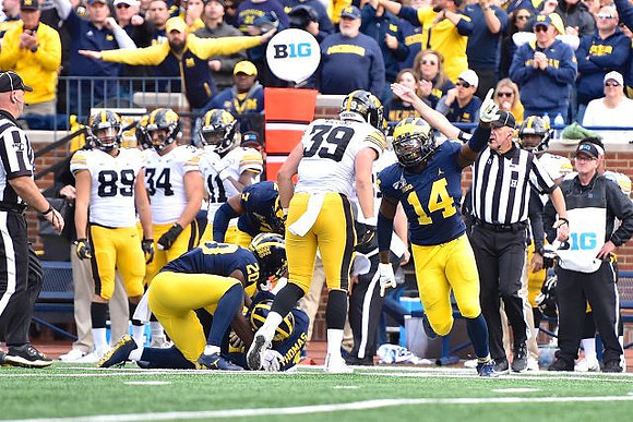 Brad Hawkins (20), Ambry Thomas (1), and Josh Metellus (14)