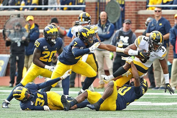 Vincent Gray (31), Brad Hawkins (20), Khaleke Hudson (7), and Daxton Hill (30)